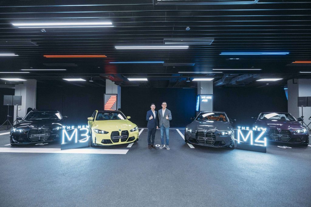 寶馬 (香港) 服務股份有限公司執行董事陳祖安及 (左) 寶馬汽車 (香港) 有限公司香港及澳門董事總經理梁健燊